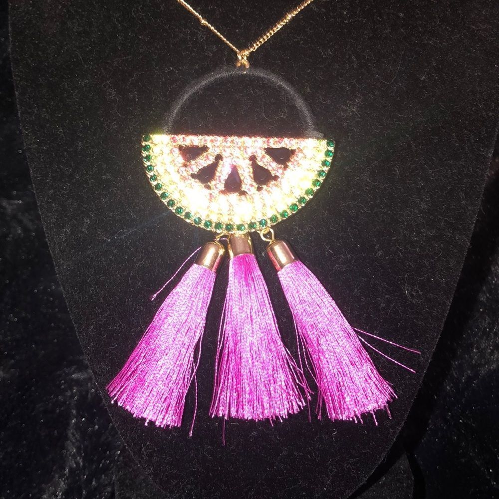 Whimsical rhinestone embellished pendant by INC
